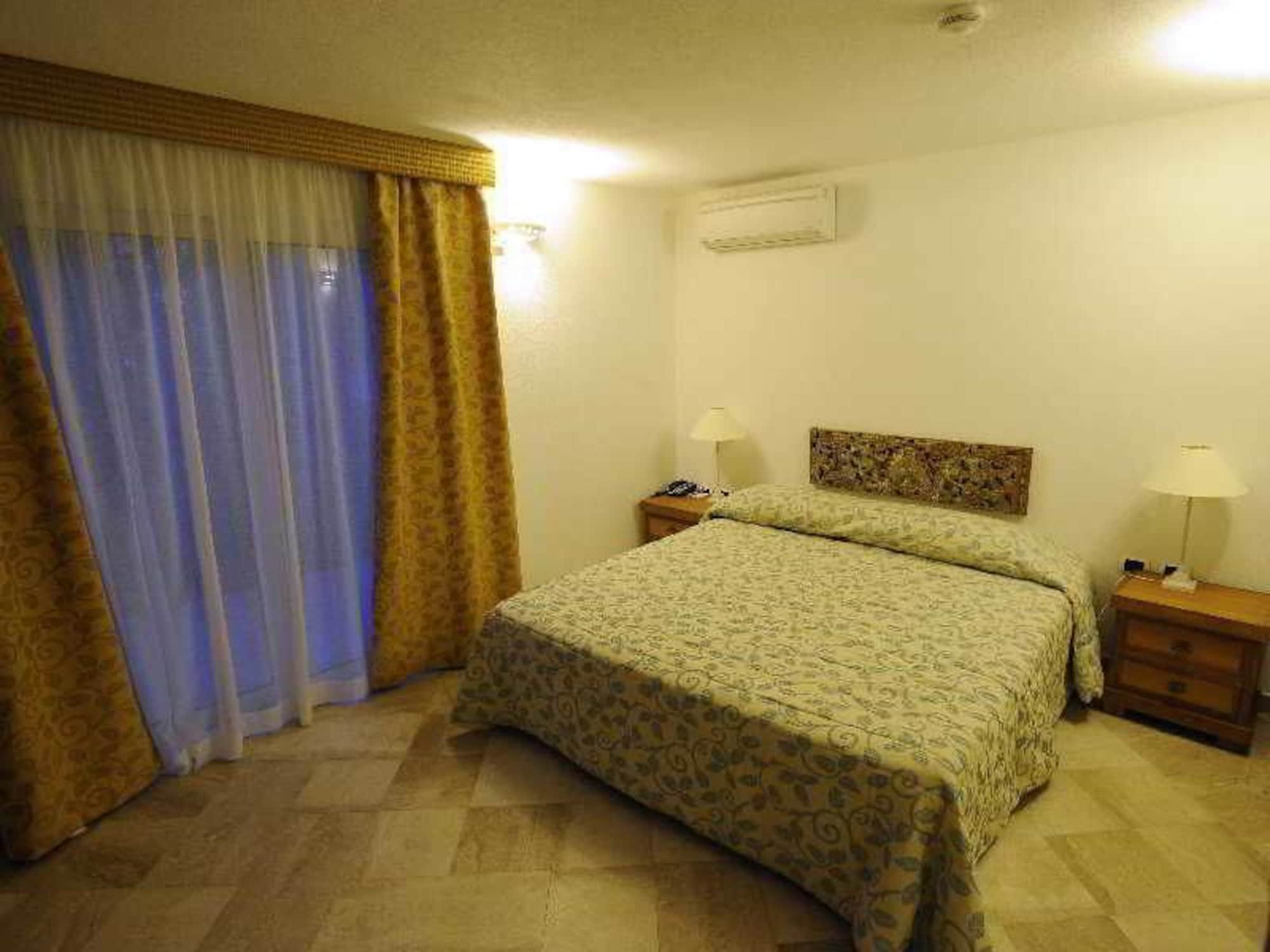 Residence Living Poltu Quatu Арцакена Экстерьер фото
